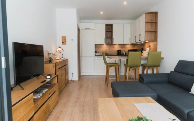 Ferienwohnung Bergsonne mit Sonnenbalkon und Tiefgaragen Parkplatz