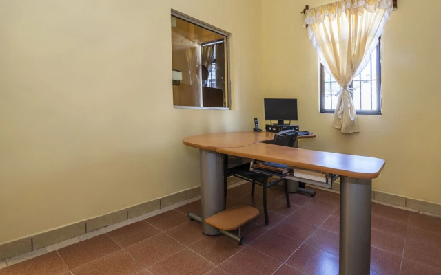 Capital O Las Calzadas Hotel & Suites
