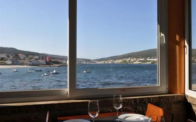 Hotel Playa de Quenxe