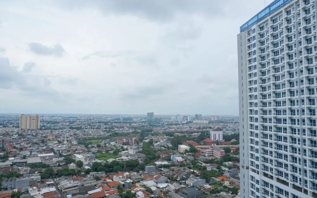 Modern with City View @ Studio Puri Mansion Apartment By Travelio