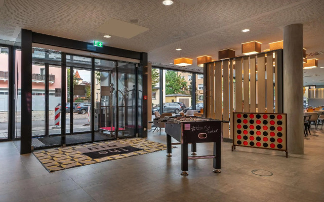 Отель Holiday Inn - the niu, Timber Esslingen, an IHG Hotel