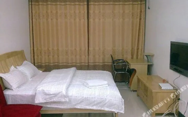 她他酒店式公寓(玉林市中医院凯旋世纪广场店)