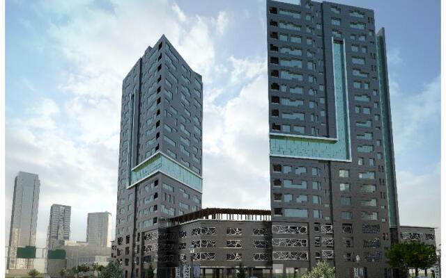 Отель Damac Maison De Ville Breeze вид на фасад