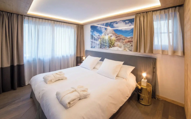 Mountain Exposure Luxury Chalets & Penthouses & Apartments