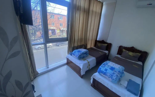 Standard Twin room (shared bathroom) (twin beds) · G&J Hotel — photo 1