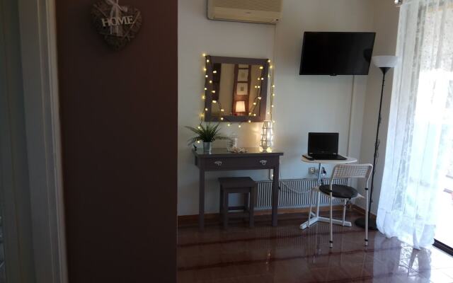 Отель Top floor cozy apartment near the beach Греция, Вари-Вула-Вулиагмени - отзывы, цены и фото номеров - забронировать отель Top floor cozy apartment near the beach онлайн комната для гостей