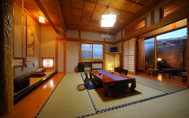 Отель Kamikita Sakura Onsen Мисава комната для гостей
