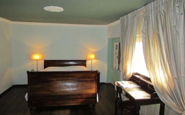 Nina Cafe Suites Hotel