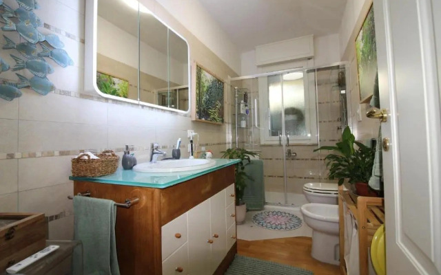 Cozy apt 10 mins walk from Poetto + terrace