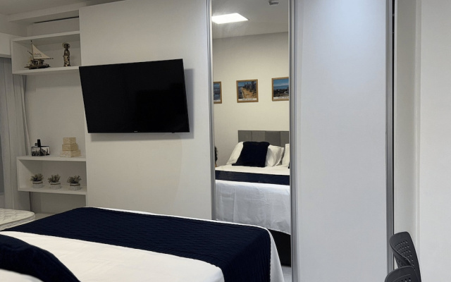 Flat com piscina a 50m da praia