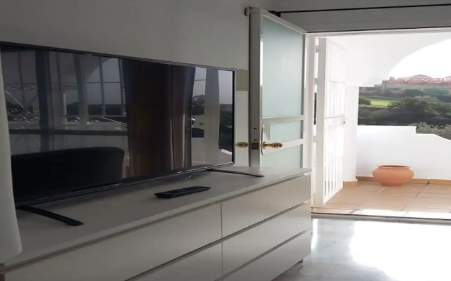 Sunny and spacious apartment with own entrance to pool