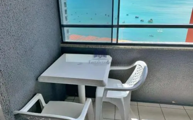 Quarto Com Vista Para O Mar Em Flat Compartilhado