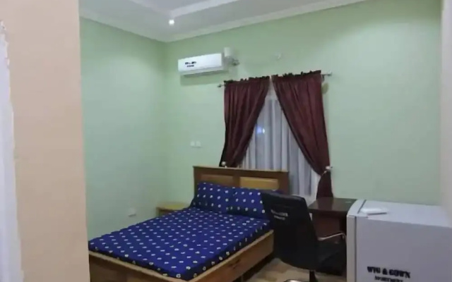 Wig and Gown Apartment