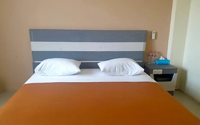 OYO 91266 Markoni 18 Guest House