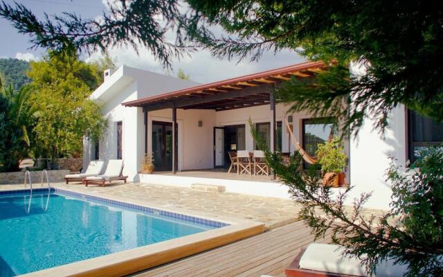 Villa Papatya by Akdenizvillam Турция, Калкан - отзывы, цены и фото номеров - забронировать отель Villa Papatya by Akdenizvillam онлайн вид на фасад
