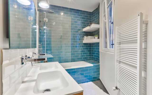 Отель Appartement familial à Montmartre