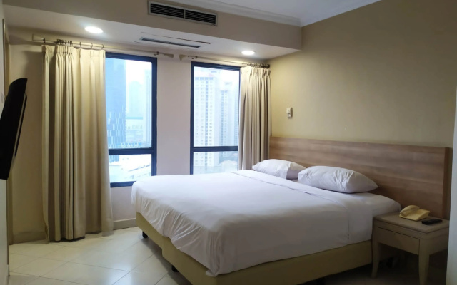 Grand Tropic Suites Hotel