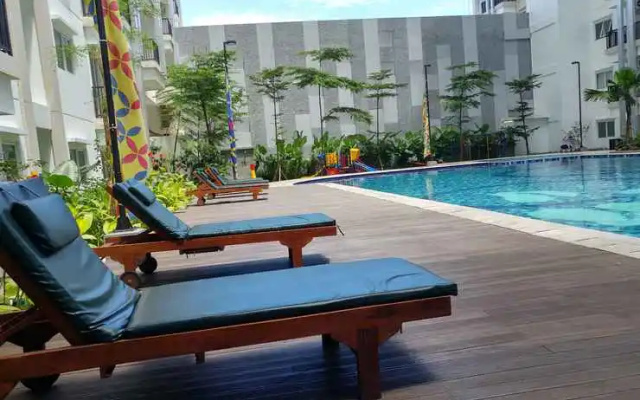 Homey 2BR Apartment at Signature Park Grande By Travelio