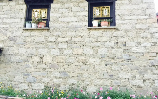 Daocheng Yading Baimaoniu Hotel