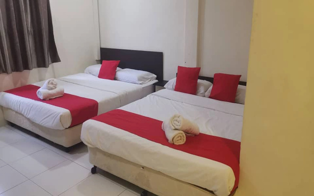 OYO 1104 Q Hotel