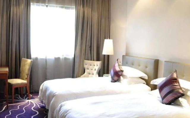 Budgetel Huadu Yiwu Hotel