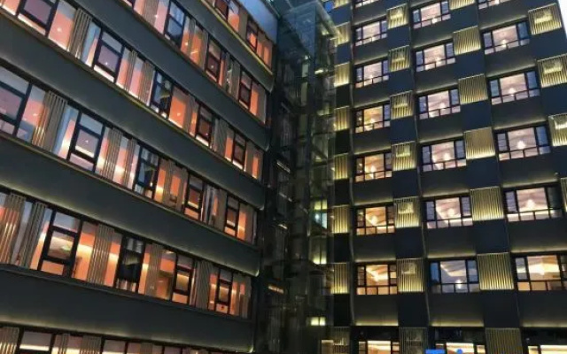 Jianguo HIDDEN Hotel (Pu'er Tea Source Plaza Daijia Alley)