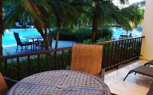 Ground-floor unit in front of lazy river pool at Pacifico in Coco