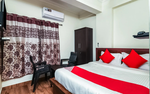 Collection O 24414 Hotel Naidu Grand Rooms