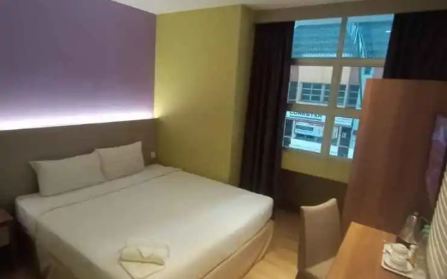 Capital O 9010 Yee Hotel