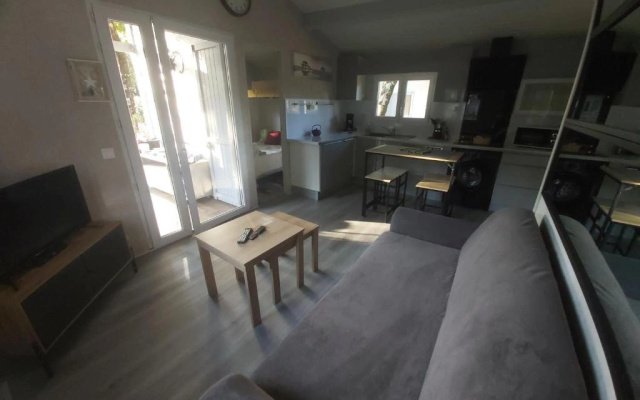 Chalet T3/clim/wifi/pkg/terrasse/15 min plages