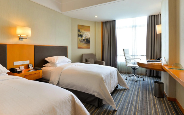 Отель Ramada Plaza by Wyndham Shanghai Pudong Airport