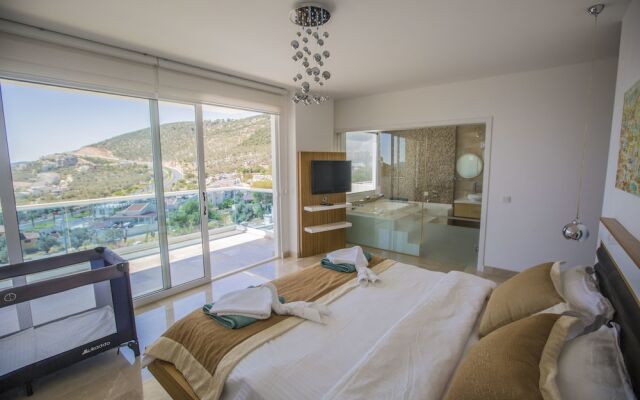 Villa Motion 1 by Akdenizvillam Турция, Калкан - отзывы, цены и фото номеров - забронировать отель Villa Motion 1 by Akdenizvillam онлайн комната для гостей