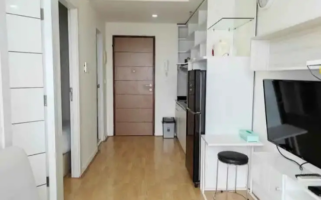 Homey and Cozy Stay 2BR Vida View Apartment By Travelio