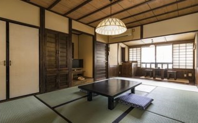 Отель Okuaso Hot spring Inn Yamanami Минамиогуни комната для гостей