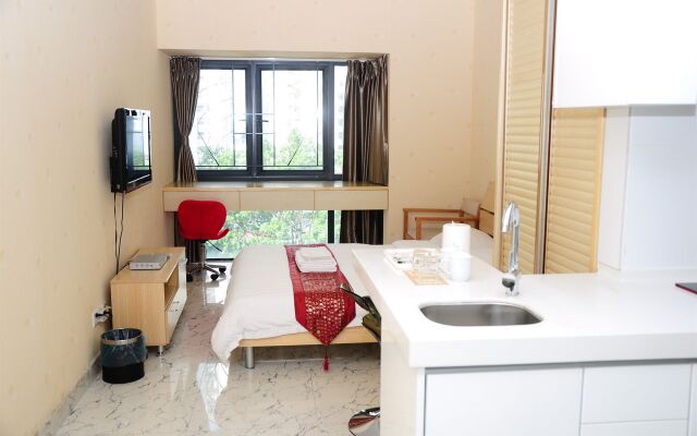 Апартаменты Shengang Apartment Shenzhen Yuhedi Branch комната для гостей