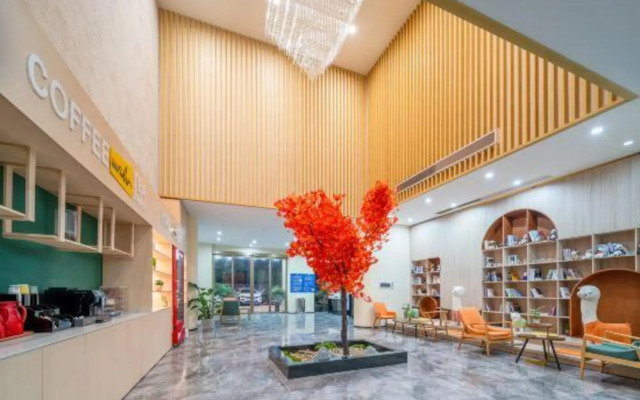 Xinyi Yunqi Hotel (Liaobu Wanrun Plaza)