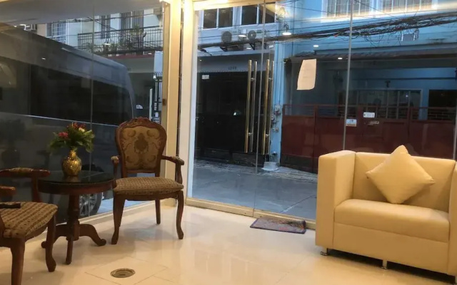 OYO 1128 W Sangco Building Leasing