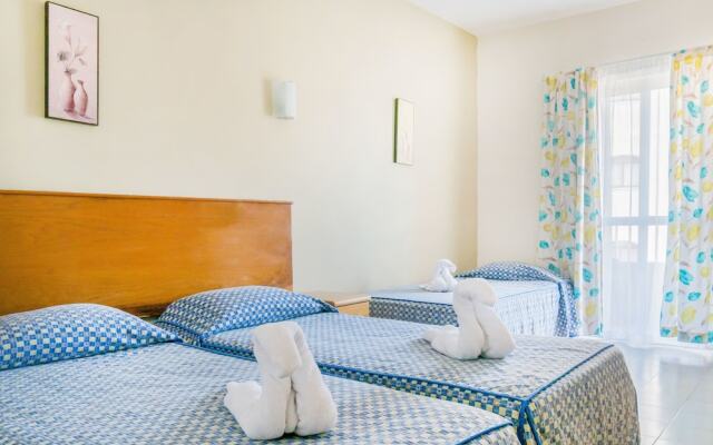 Отель Qawra Point Holiday Complex Мальта, Каура - отзывы, цены и фото номеров - забронировать отель Qawra Point Holiday Complex онлайн комната для гостей