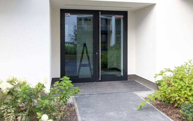 Отель M&R Apartament Airport Konstruktorska 7 вид на фасад