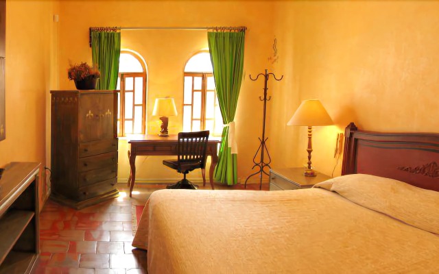Отель Trocadero Suites комната для гостей