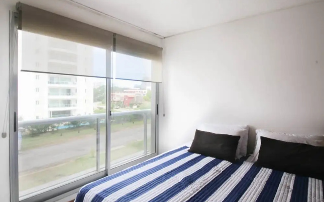 Apartamento con piscina compartida The Point I