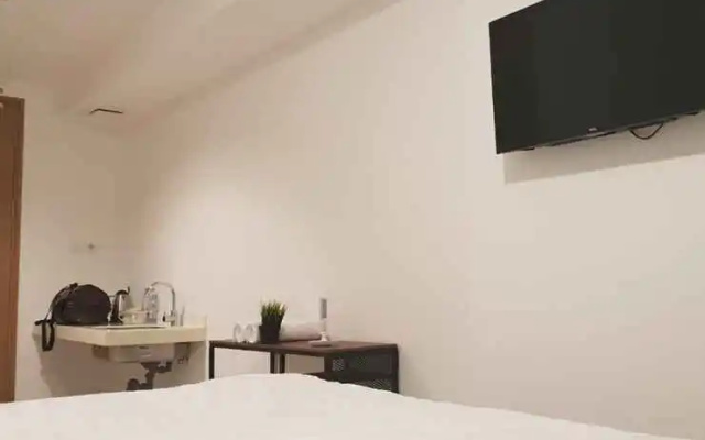 Alpine Room at TreePark City Apartemen