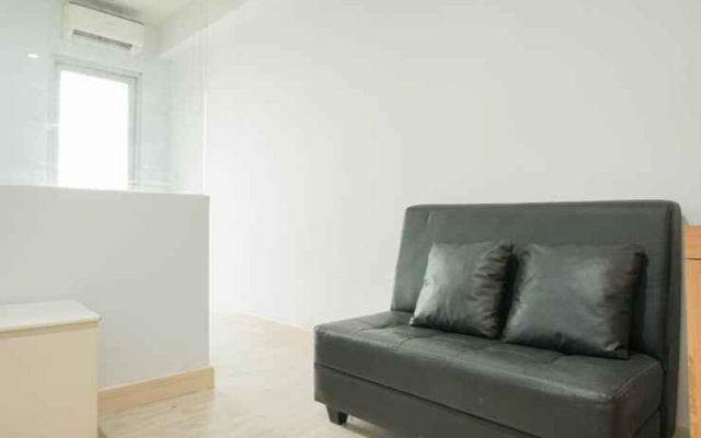 Simply and Cozy Studio Titanium Square Apartment By Travelio