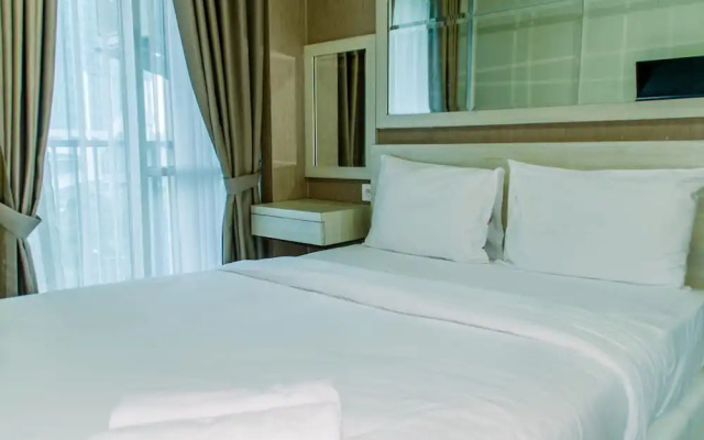 Homey And Warm Studio Room At Tifolia Apartment