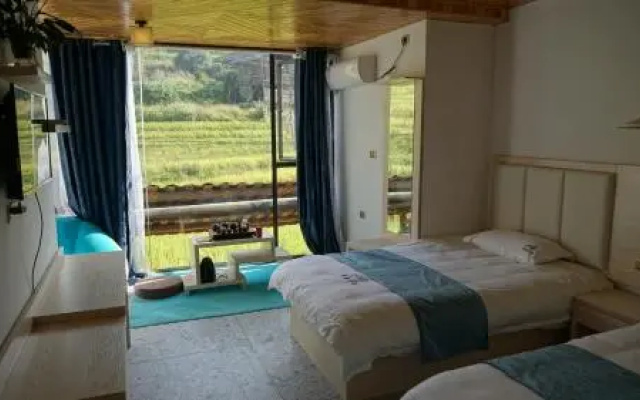 Longsheng Longji Puchuo Shengxiang Art Hotel