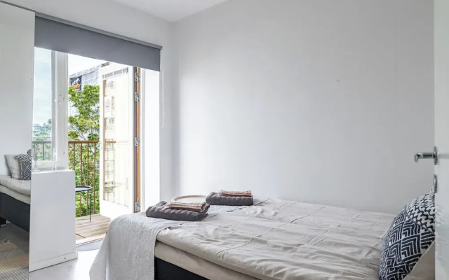 Modern 1BR Home with Sauna & Balcony