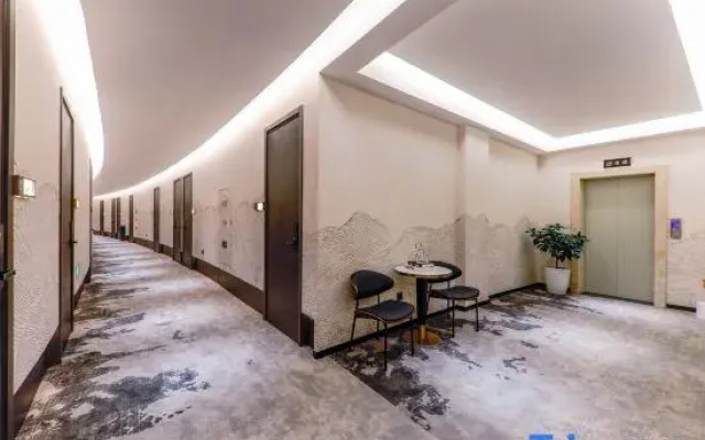 Yixin Design Hotel (Guangchang Bus Station)