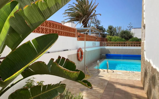 Beach house with the heated pool next to Rocky Point