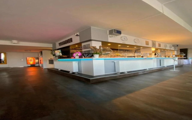 Отель BeeVillage Messehotel Hannover-Laatzen