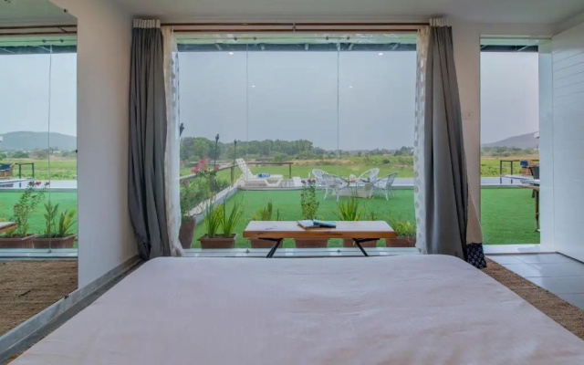 SaffronStays Onellaa, Nashik - infinity pool villa surrounded by a vineyard